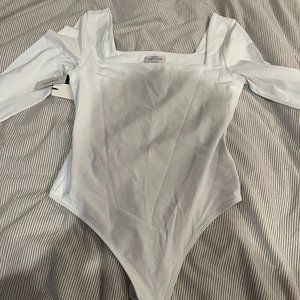Aritizia white body suit, size Large
